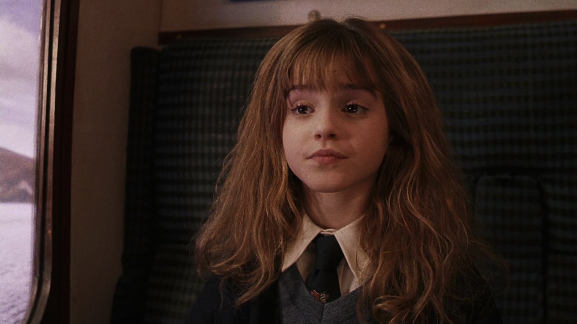 Emma Watson como Hermione Granger em Harry Potter e a Pedra Filosofal (2001)