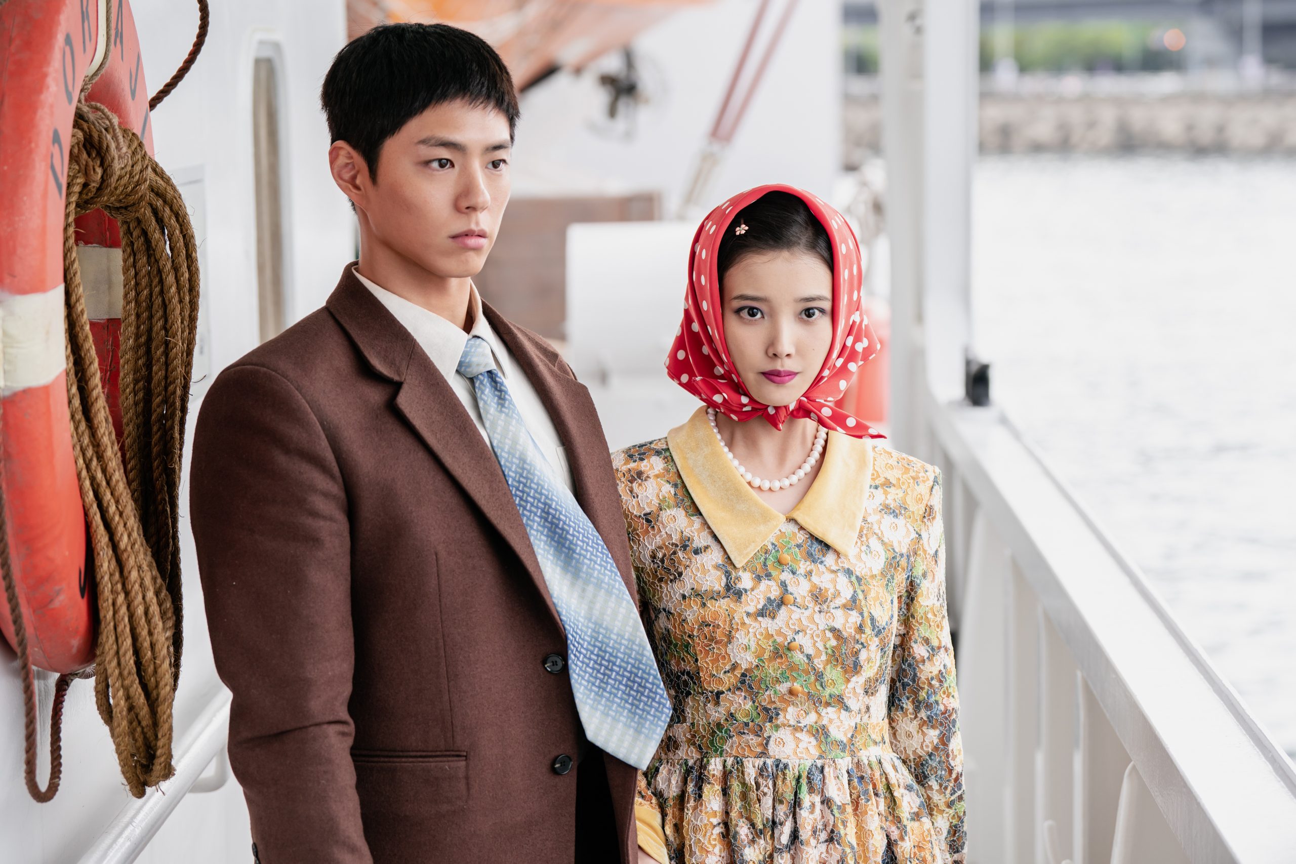 When Life Gives You Tangerines (L to R) Park Bo-gum as Yang Gwan-sik, IU as Oh Ae-sun in When Life Gives You Tangerines Cr. Yoo Eun-mi/Netflix © 2025